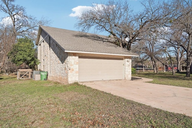 view of home's exterior with a garage and a lawn