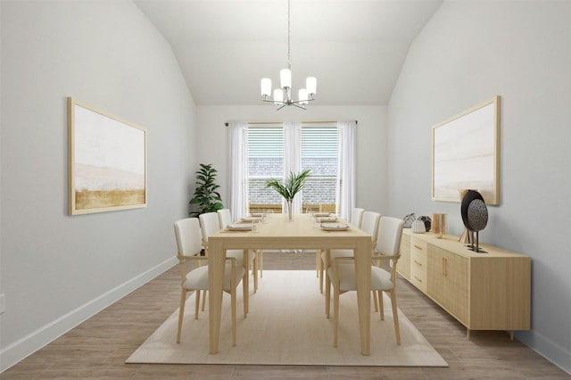 dining area featuring wood-type flooring, lofted ceiling, and a notable chandelier