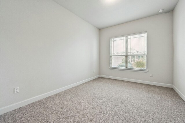 empty room with carpet floors