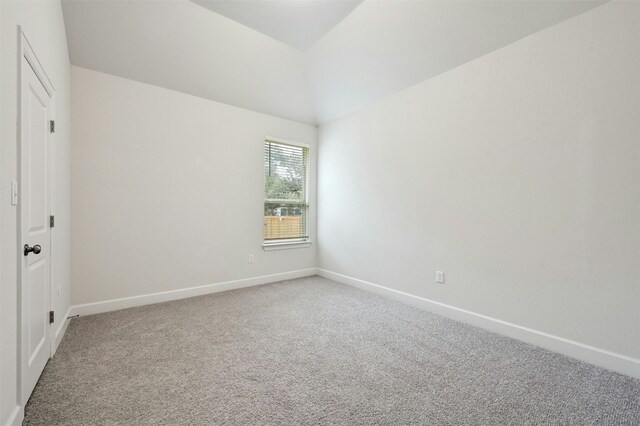 unfurnished room with carpet flooring