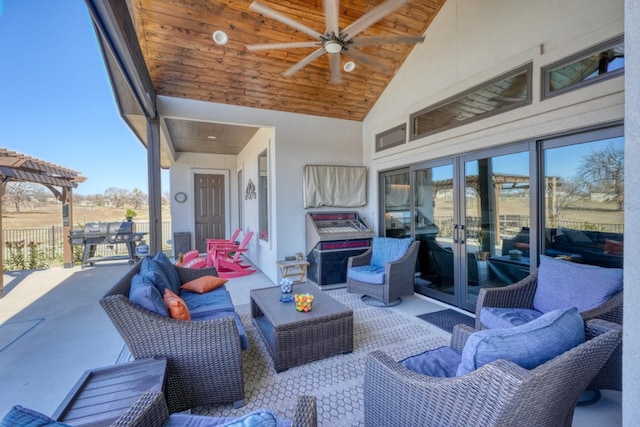 view of patio with ceiling fan, french doors, and an outdoor living space