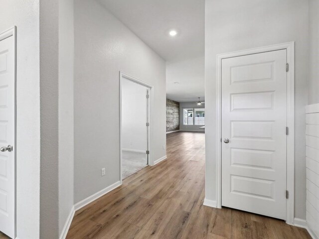 corridor featuring light wood-type flooring