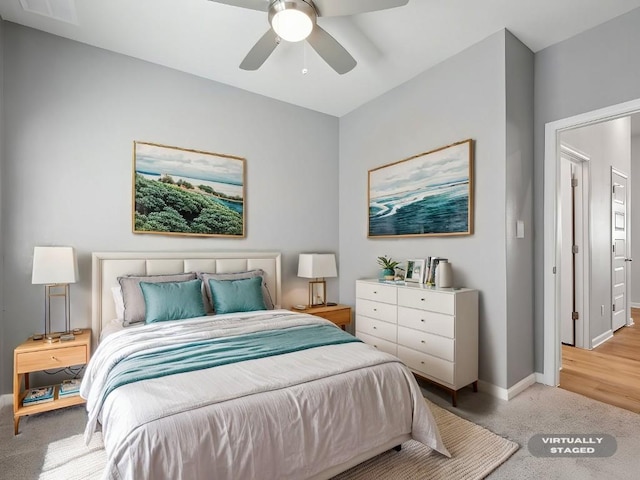 carpeted bedroom featuring ceiling fan