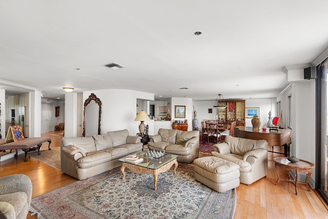 living room with light hardwood / wood-style flooring