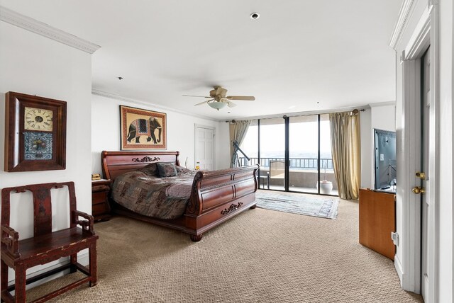 bedroom with ceiling fan, expansive windows, access to exterior, and light carpet