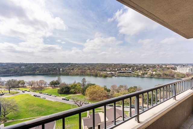 balcony featuring a water view