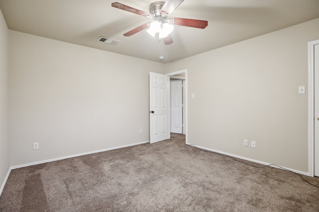 carpeted empty room with ceiling fan