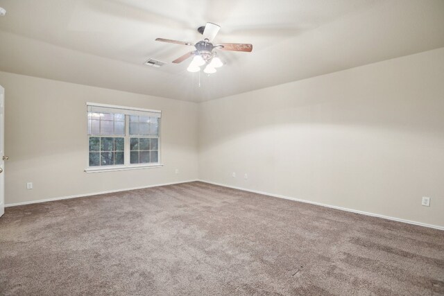 carpeted empty room with ceiling fan