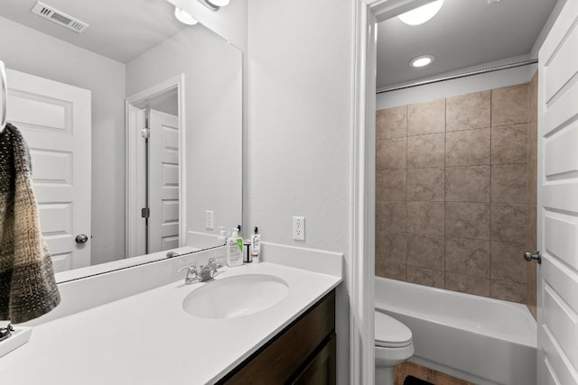 232 Syrah Ct, Leander, TX 78641 - bathroom with vanity, toilet, shower / washtub combination, and recessed lighting