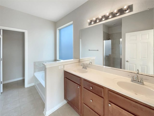 bathroom featuring tile patterned floors, vanity, and plus walk in shower