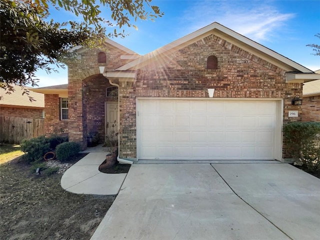 single story home featuring a garage