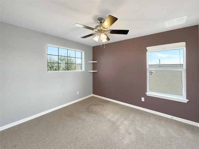 carpeted empty room with ceiling fan