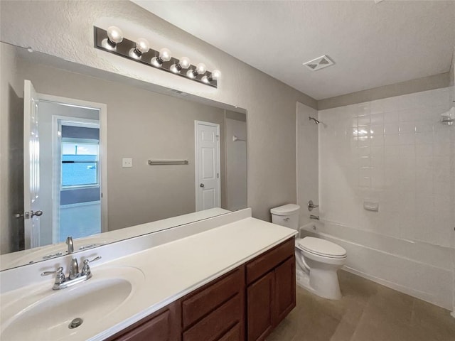 full bathroom with shower / tub combination, tile patterned flooring, vanity, and toilet