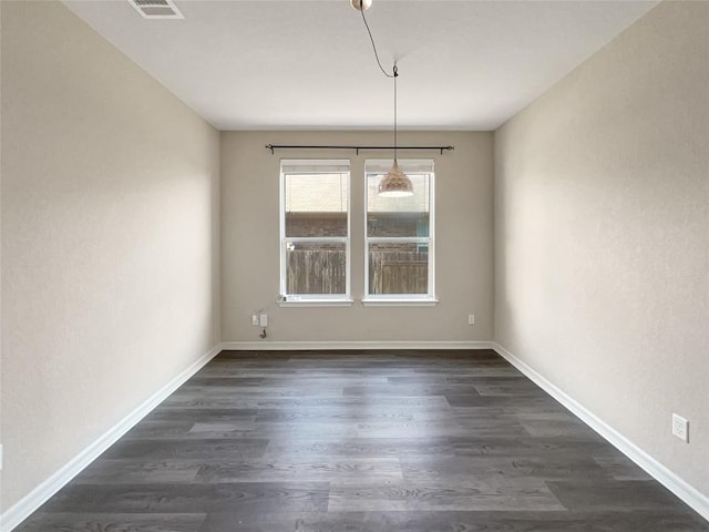 unfurnished dining area with dark hardwood / wood-style floors