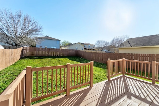 deck featuring a lawn