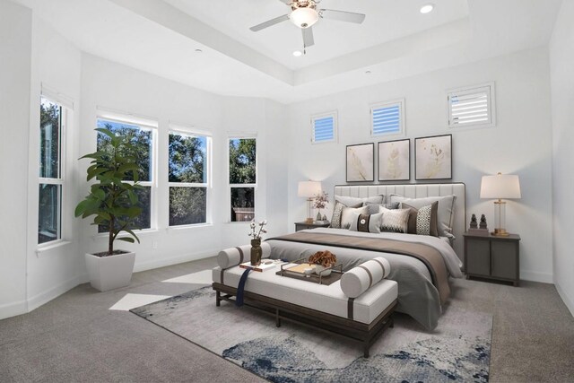 carpeted bedroom featuring recessed lighting, multiple windows, and baseboards