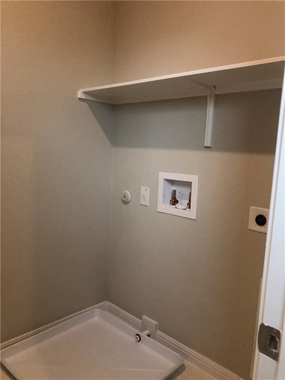 clothes washing area featuring electric dryer hookup, hookup for a gas dryer, and washer hookup