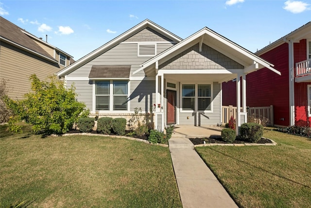 view of front facade featuring a porch and a front yard