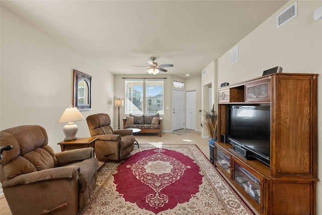 living room featuring ceiling fan