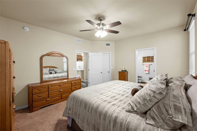 bedroom featuring ceiling fan and light colored carpet