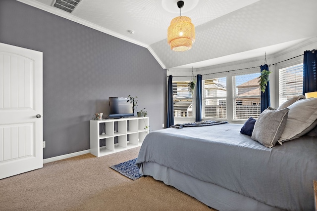 bedroom featuring carpet, vaulted ceiling, and ornamental molding