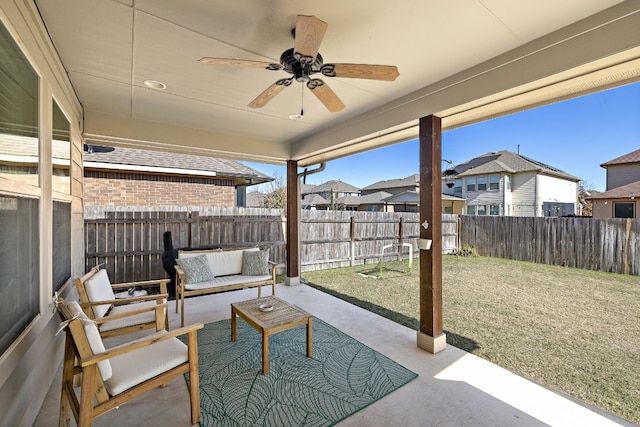 view of patio / terrace featuring ceiling fan