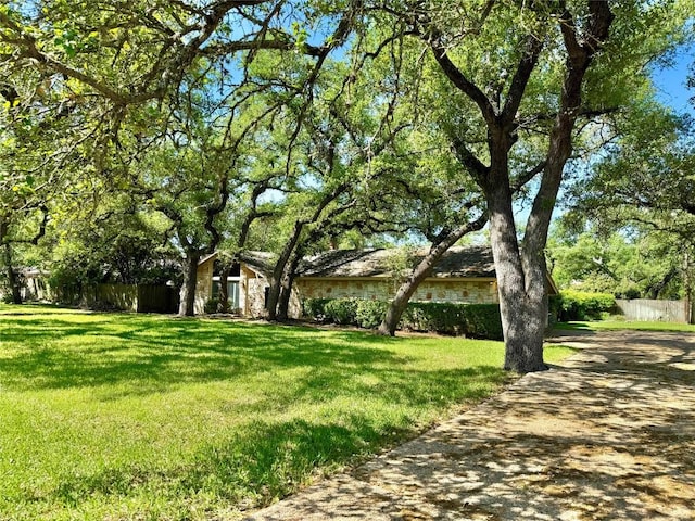 view of yard featuring fence
