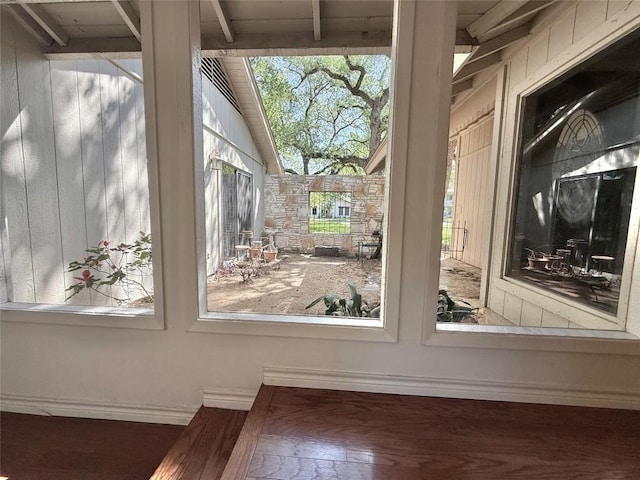 details with wood finished floors and baseboards