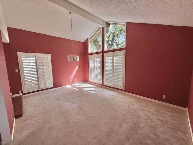 unfurnished room featuring high vaulted ceiling, a textured ceiling, carpet floors, baseboards, and beam ceiling