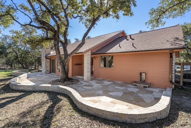 rear view of house with a patio area