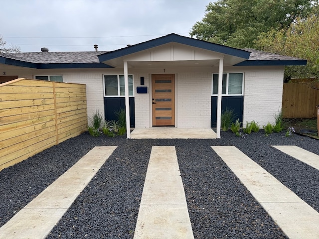 view of front of home featuring a patio area