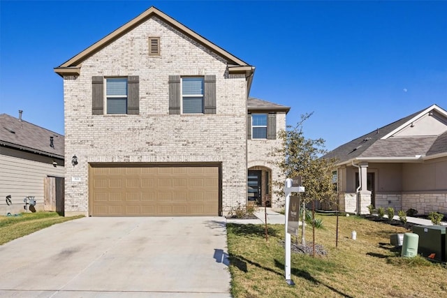 front facade with a front yard and a garage