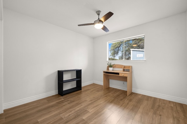 interior space featuring ceiling fan and hardwood / wood-style flooring