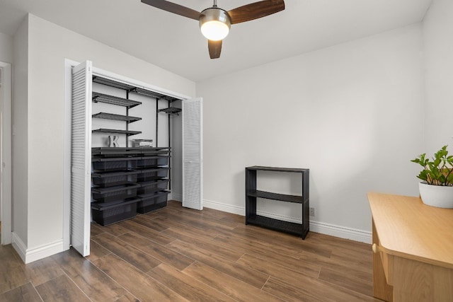 bedroom featuring ceiling fan and a closet