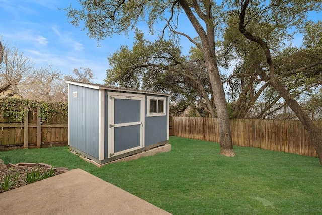 view of outbuilding featuring a yard