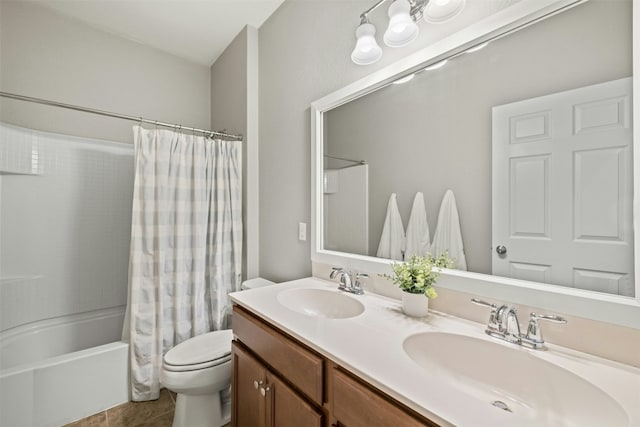 full bathroom with tile patterned flooring, vanity, toilet, and shower / bath combo with shower curtain