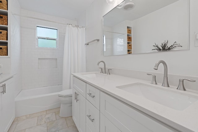 full bathroom with vanity, toilet, and shower / bath combo with shower curtain