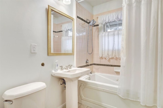 1710 Lexington St, Taylor, TX 76574 - full bathroom featuring toilet and shower / tub combo