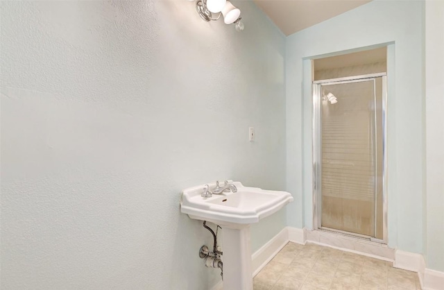 1710 Lexington St, Taylor, TX 76574 - bathroom with a shower stall