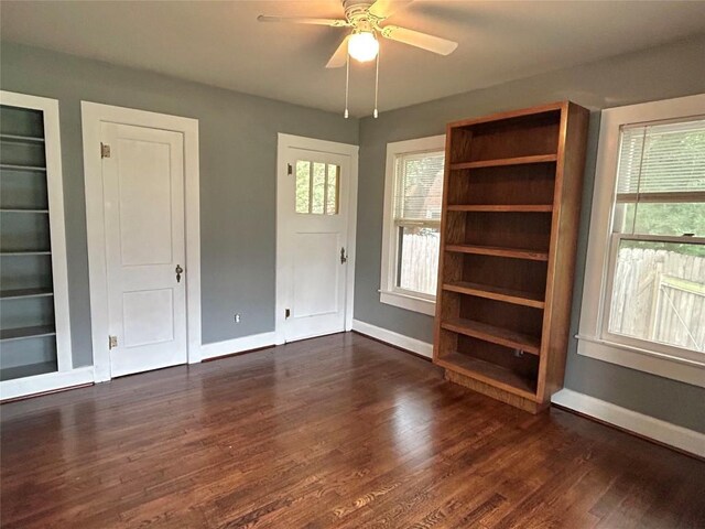 1710 Lexington St, Taylor, TX 76574 - empty room with dark wood-style flooring and ceiling fan