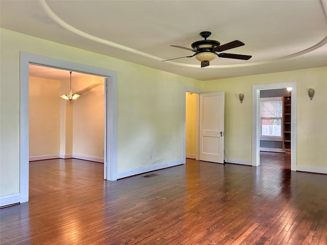 1710 Lexington St, Taylor, TX 76574 - spare room with dark wood finished floors and ceiling fan