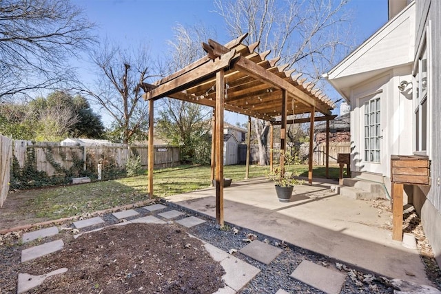 view of patio / terrace featuring a storage unit, a fenced backyard, a pergola, and an outdoor structure