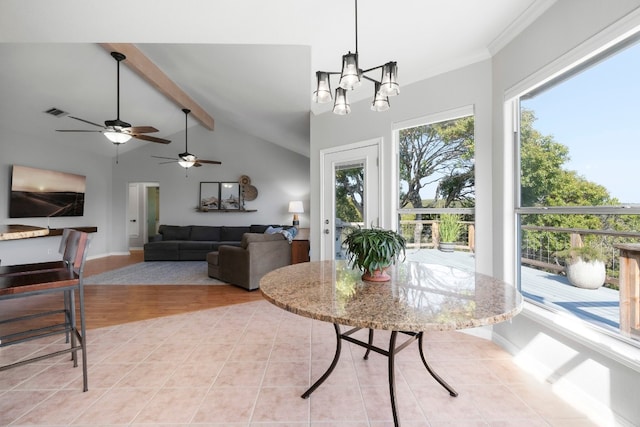 dining area with baseboards, visible vents, lofted ceiling with beams, light wood-style floors, and a chandelier