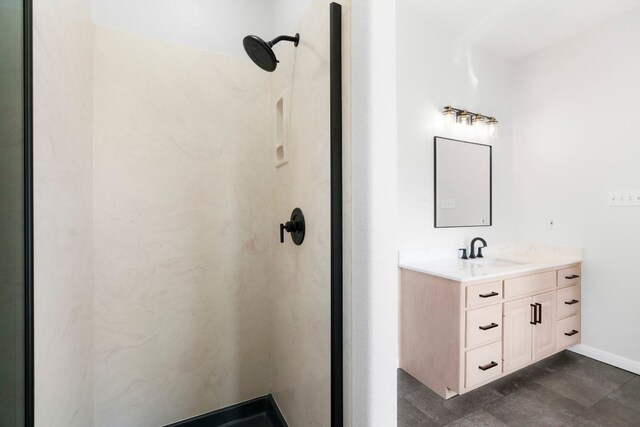 bathroom with walk in shower and vanity