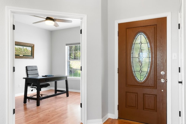 entrance foyer featuring ceiling fan and light hardwood / wood-style flooring