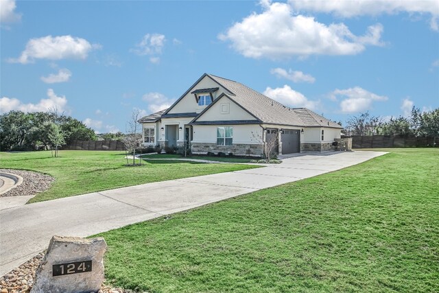 craftsman-style home featuring a front lawn