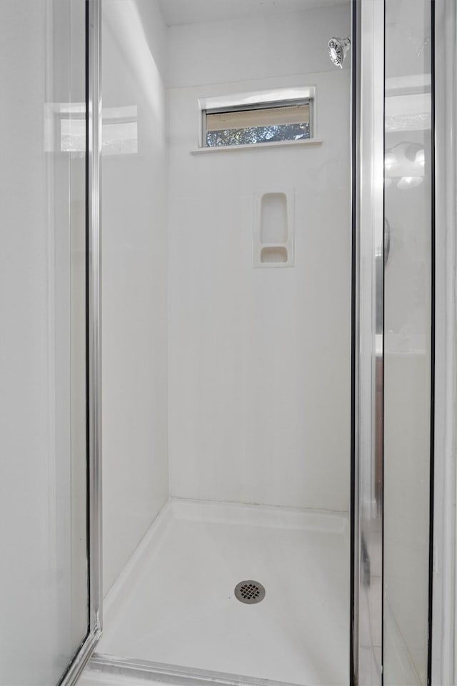 bathroom with an enclosed shower