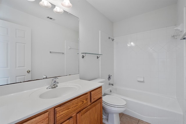 full bathroom with  shower combination, tile patterned floors, vanity, and toilet