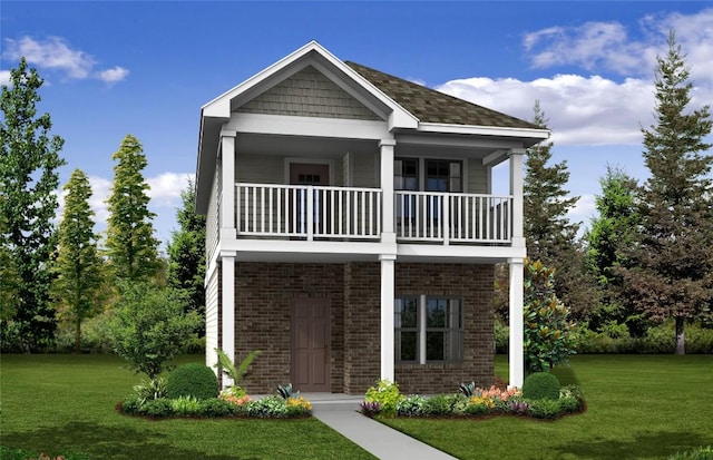 view of front of home featuring a balcony and a front lawn