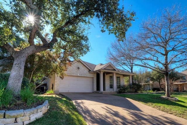 single story home with a garage and a front lawn